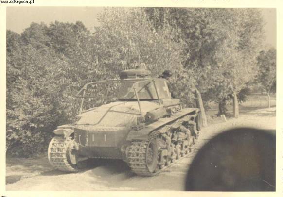 Rear view of a Panzerbefehlswagen on the chassis of Pz Kw 35 (t) of the 1. Le Div stopped somewhere in a Polish route ........................