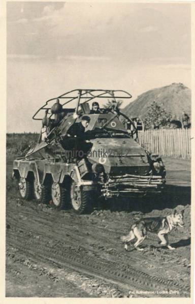 A Funkwagen Sd Kfz 263 (8-rad) of Panzergruppe Guderian closely following the movements of the dog ........................