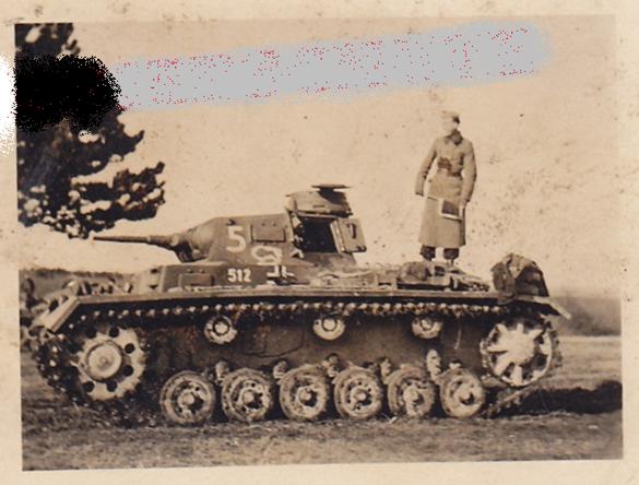 A Pz Kw III Ausf. F (I think) with a gun of 3.7 cm and belonging to the PR 7? (see the emblem) ...........................................