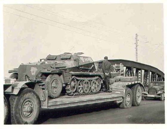 A Sd. Ah. 116 with a Sd Kfz 252 le. gep. Munitionstransportwagen (light armored transport of ammunition) of Stug. Abt. 210 with a puncture........................................................