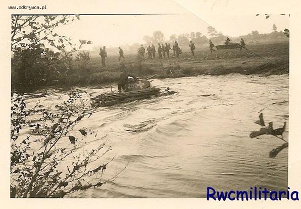 A Pz Kw II of PR 1 fording a river somewhere in Poland.......................