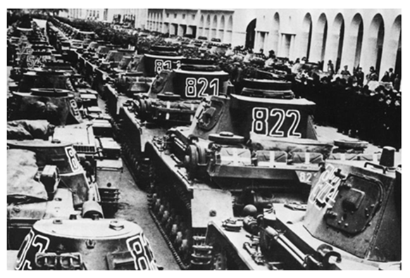 Pz Kw I and II to left and Pz Kw IV to the right; all are painted in dark grey with large numbers in the turret..........................................