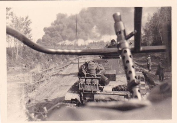 An armored column on the move to the battlefront; in the foreground (seemingly) an Sd Kfz 263 and ahead the Pz Kw II No. R05 ........................