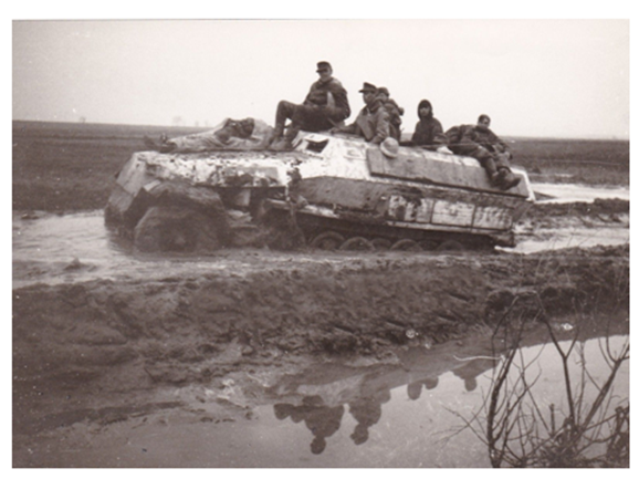 A Sd Kfz 251 Ausf. C with winter camouflage of the SS Wiking advances in tenacious fight against the mud ....................................................