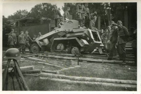 A Panzerspähwagen Sd Kfz 231 6-rad of Panzerzug No. 3 (armored train No. 3) that apparently suffered some mishap ..............................................